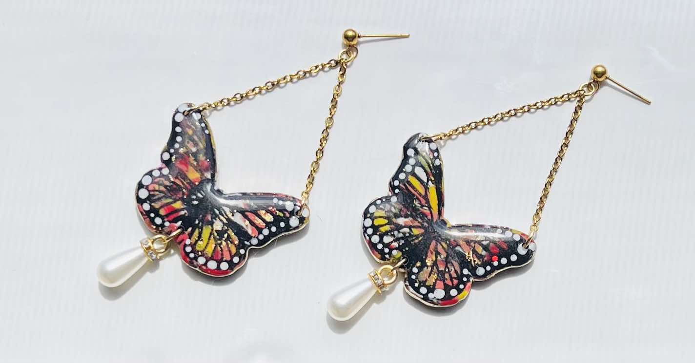 Rustic faux pearl butterflies