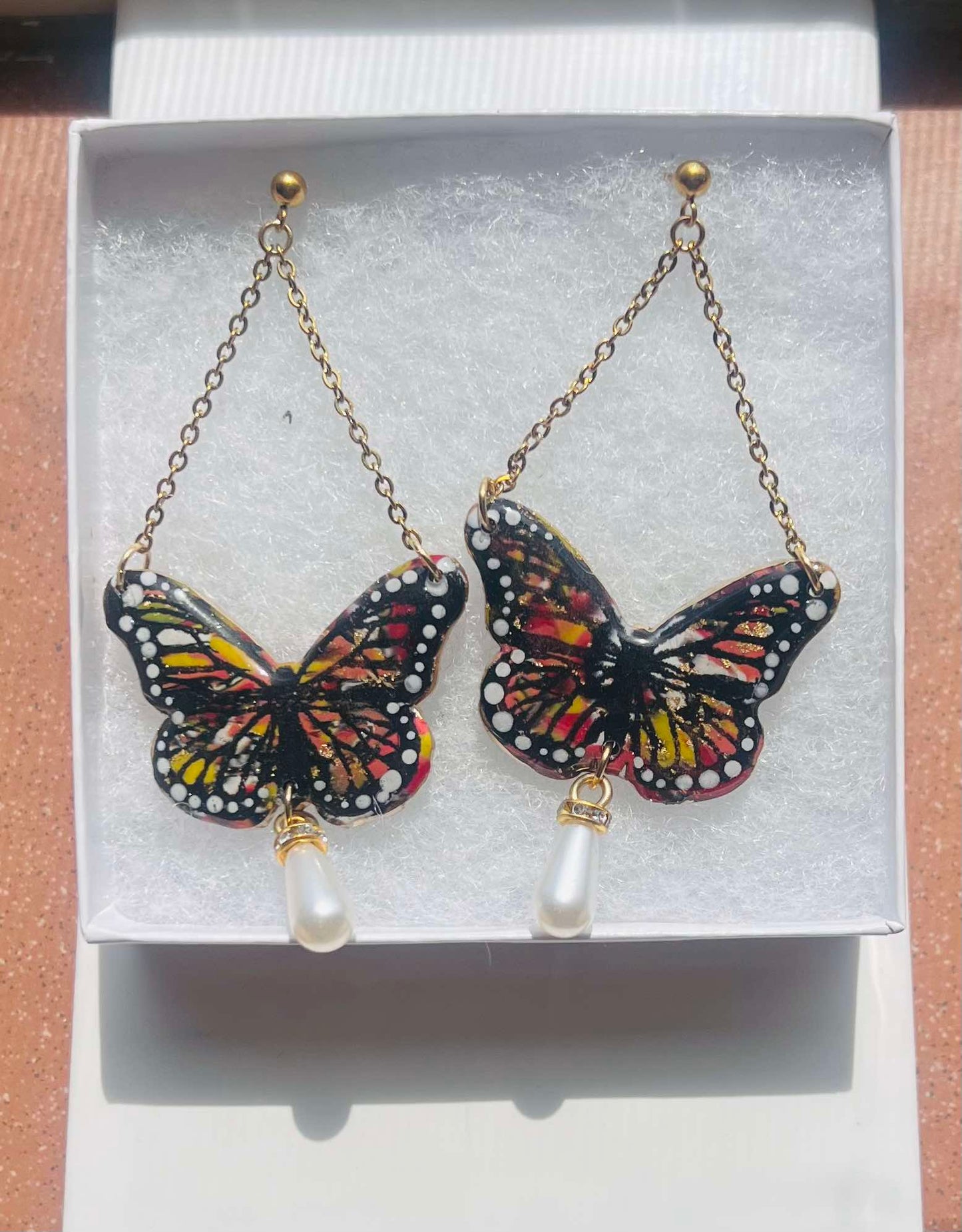 Rustic faux pearl butterflies
